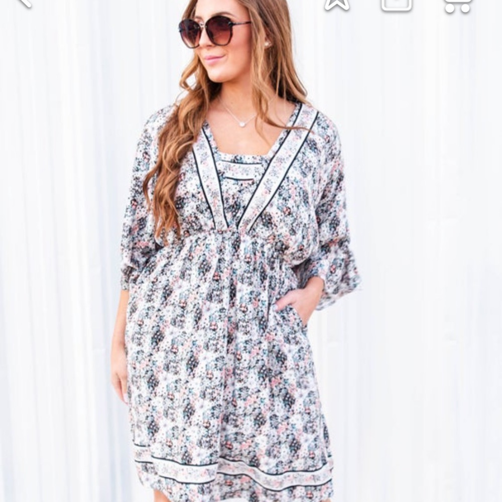 Bell sleeve Floral Dress! New in package!